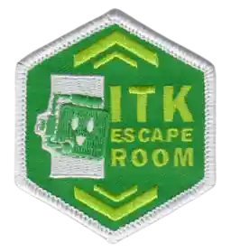 We decided to remake the escape room patch to fit with the rest of our new patch design. Funnier fact, they were ordered slightly too small. We were very confused because it was barely noticeable, but still enough to make sewing them together with other patches annoying. We fixed this for 2024